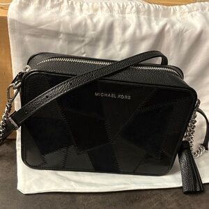 Michael Kors, Jet set ,  Black Crossbody Bag with Silver  and attached fringe